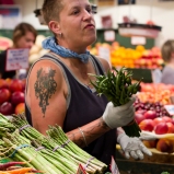Market vendor with tattoo